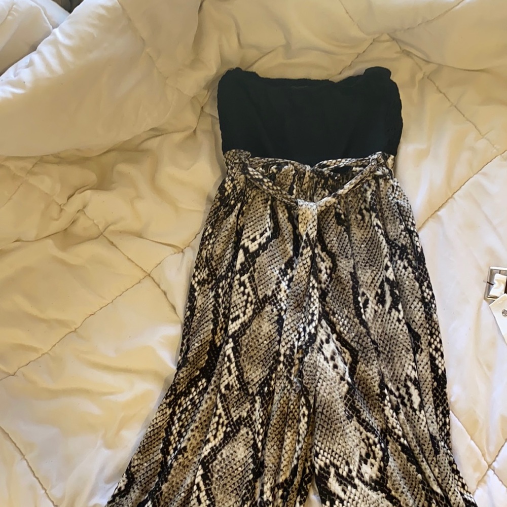 Jumpsuit/ Capri. Snakeskin bottom with black top. Super comfy and cute!